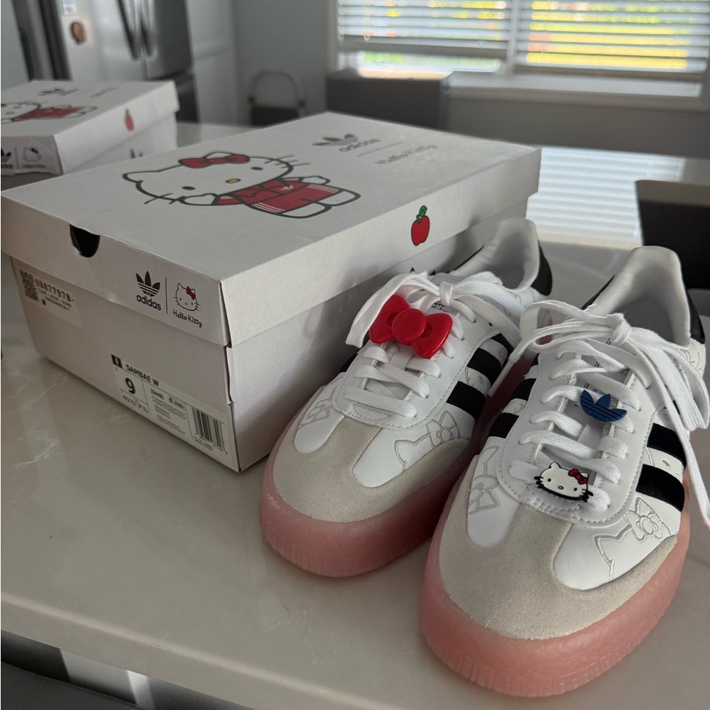 adidas White and Black Athletic Shoes with Pink Soles